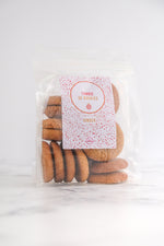 Load image into Gallery viewer, Branded clear pouch of ginger koekies
