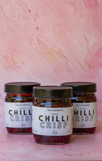Load image into Gallery viewer, Three 500ml jars of Chilli Crisp flanking each other
