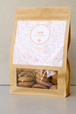 Load image into Gallery viewer, Large brown pouch filled with ginger koekies
