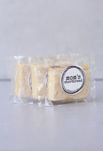 Load image into Gallery viewer, Mom&#39;s shortbread - traditional Scottish butter shortbread, packaged in cellophane and finished with a black sticker that says &#39;Mom&#39;s Shortbread&#39;.

