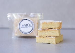 Mom's shortbread - traditional Scottish butter shortbread, packaged in cellophane and finished with a black sticker that says 'Mom's Shortbread'.