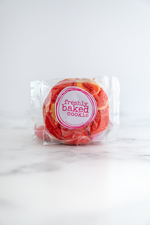 Red velvet cookie in branded packaging