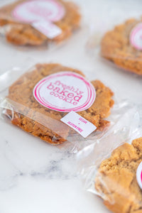 Vegan gluten-free peanut butter cookies in branded packaging